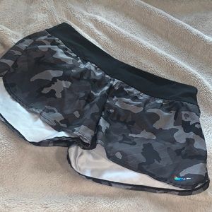 Selling : grey and black camo Nike running shorts
